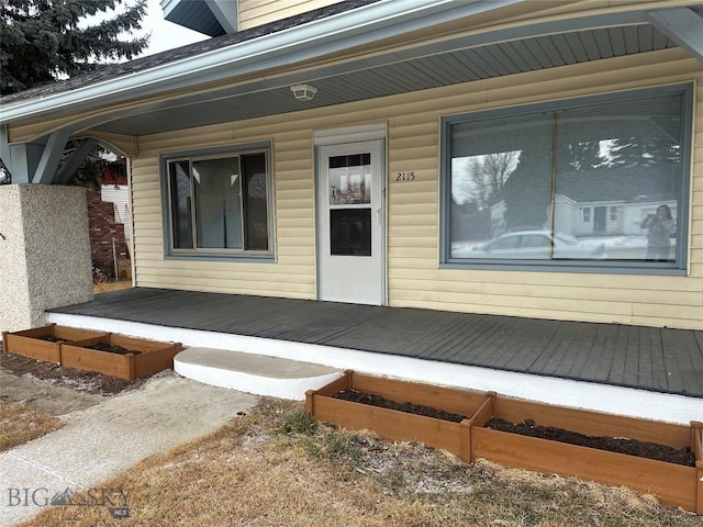 entrance to property with covered porch