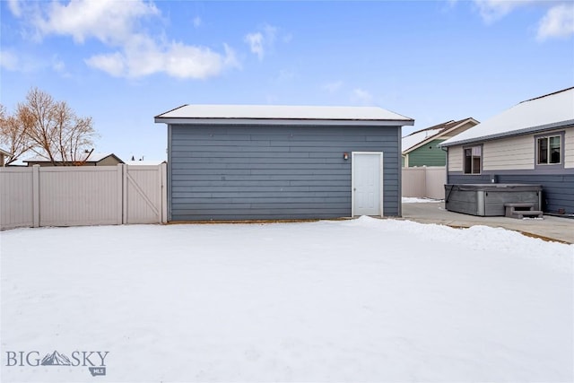 view of snow covered garage