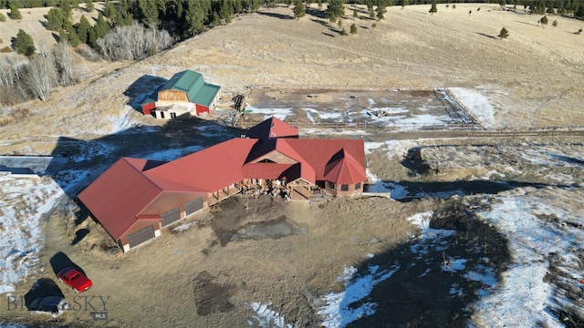 birds eye view of property featuring a rural view