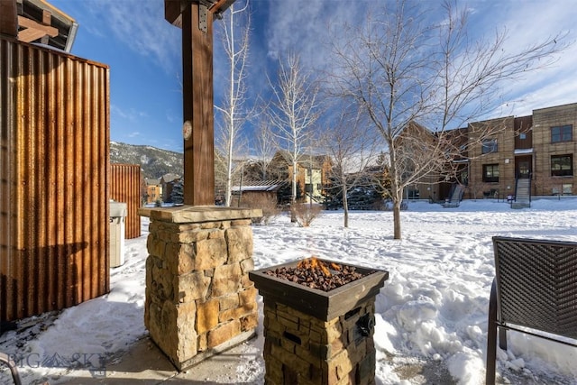 view of snow covered patio