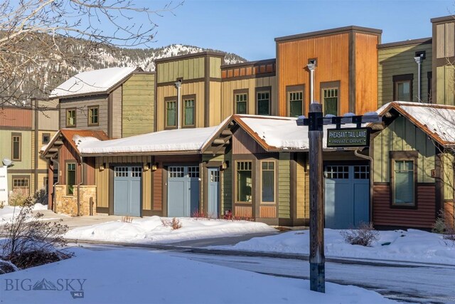 view of front of property with a mountain view