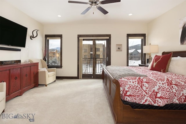 bedroom featuring ceiling fan, light colored carpet, and access to outside