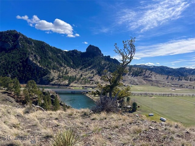 property view of mountains with a rural view and a water view