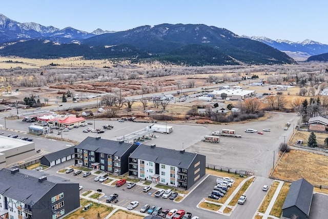 drone / aerial view featuring a mountain view