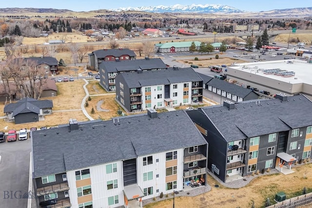 birds eye view of property with a residential view and a mountain view