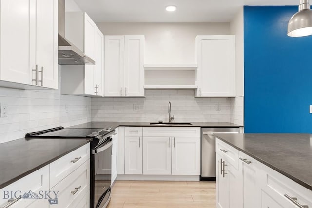 kitchen featuring a sink, black electric range oven, dishwasher, open shelves, and dark countertops