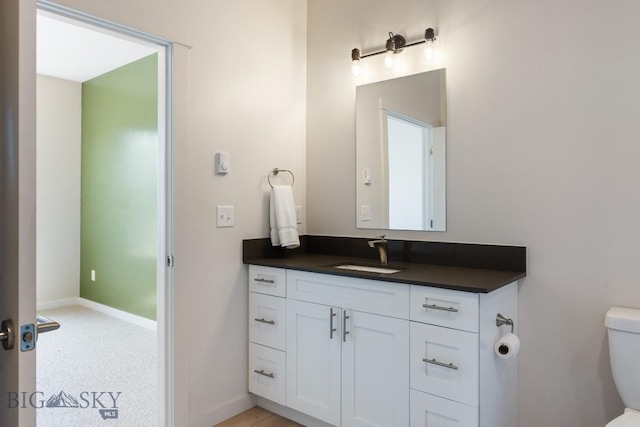 2221F Willow Unit 104, Livingston, MT 59047 - half bath with toilet, vanity, and baseboards