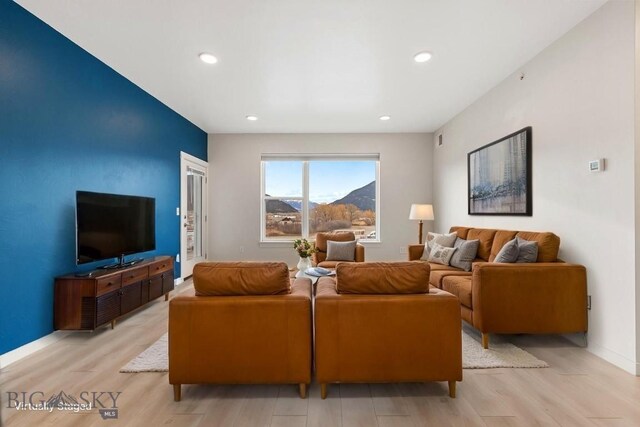 2221F Willow Unit 104, Livingston, MT 59047 - living area featuring light wood finished floors, recessed lighting, and baseboards