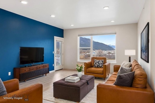 2221F Willow Unit 104, Livingston, MT 59047 - living area with wood finished floors, recessed lighting, and baseboards