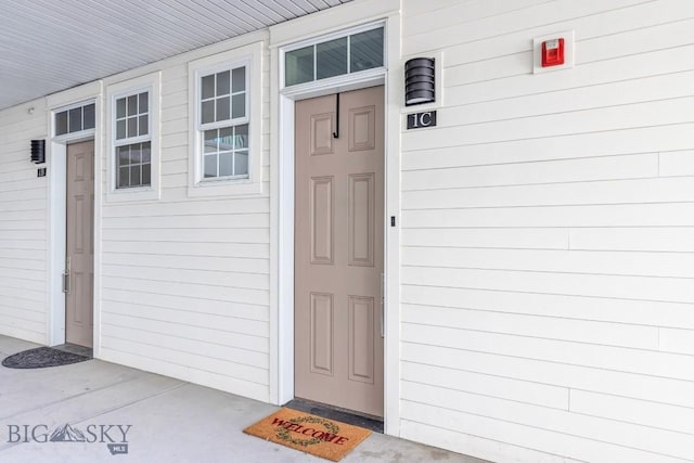 doorway to property featuring a porch