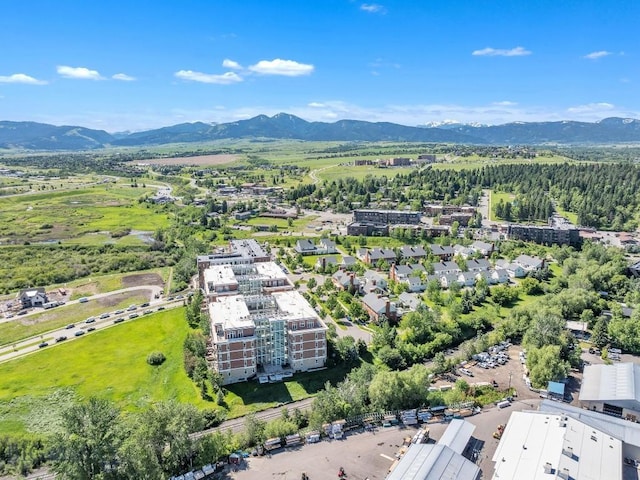 drone / aerial view featuring a mountain view