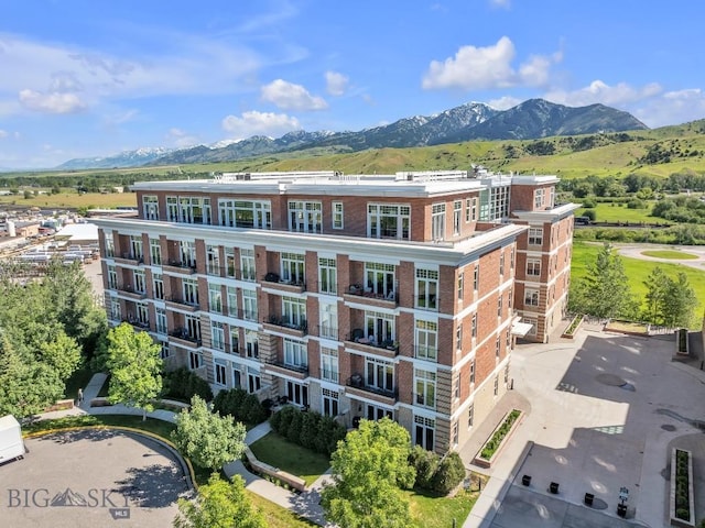 view of building exterior with a mountain view