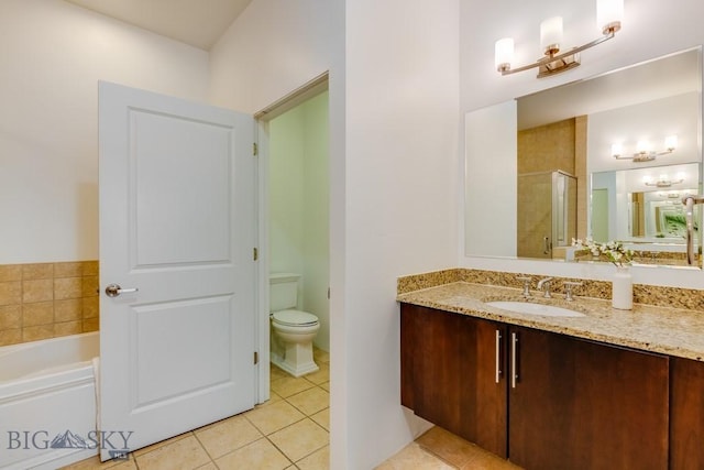 full bathroom featuring separate shower and tub, tile patterned flooring, vanity, and toilet