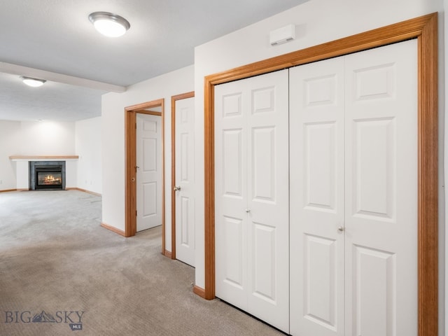 hallway with light carpet