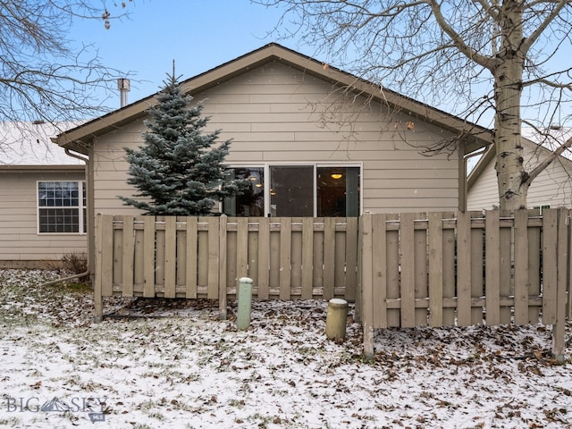 view of snow covered property