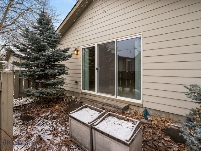 view of snow covered property