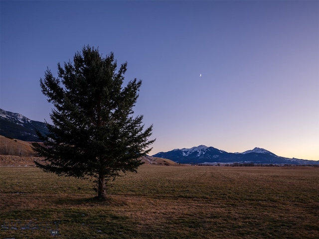 view of mountain feature with a rural view