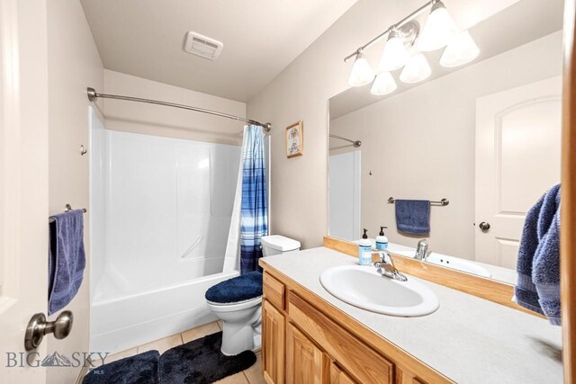 1311 Cruiser Ln, Belgrade, MT 59714 - full bath with tile patterned flooring, shower / tub combo with curtain, and vanity