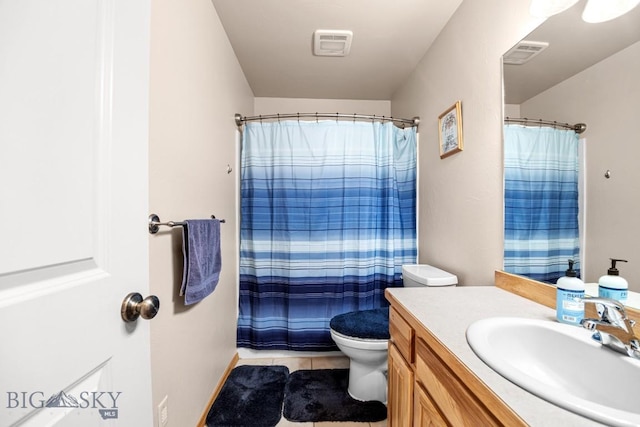 1311 Cruiser Ln, Belgrade, MT 59714 - full bath with vanity, tile patterned floors, and curtained shower