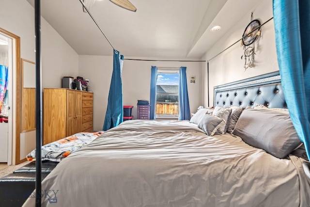 1311 Cruiser Ln, Belgrade, MT 59714 - bedroom with lofted ceiling and ceiling fan