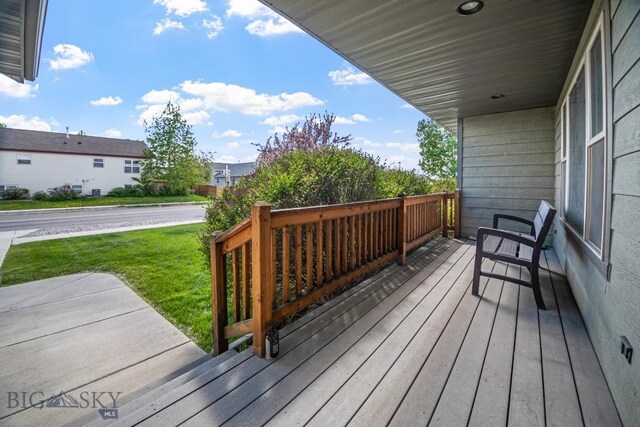 1311 Cruiser Ln, Belgrade, MT 59714 - deck with a yard