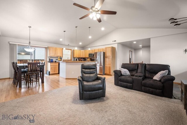1311 Cruiser Ln, Belgrade, MT 59714 - living area with ceiling fan, light wood-style floors, recessed lighting, and high vaulted ceiling