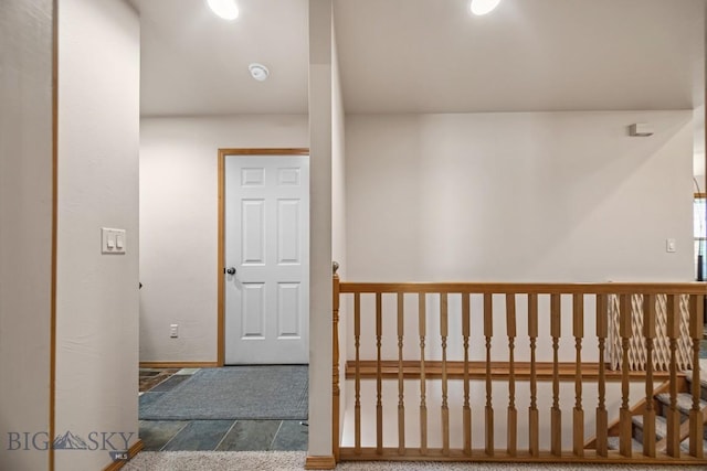 1311 Cruiser Ln, Belgrade, MT 59714 - hall with baseboards and stone finish floors
