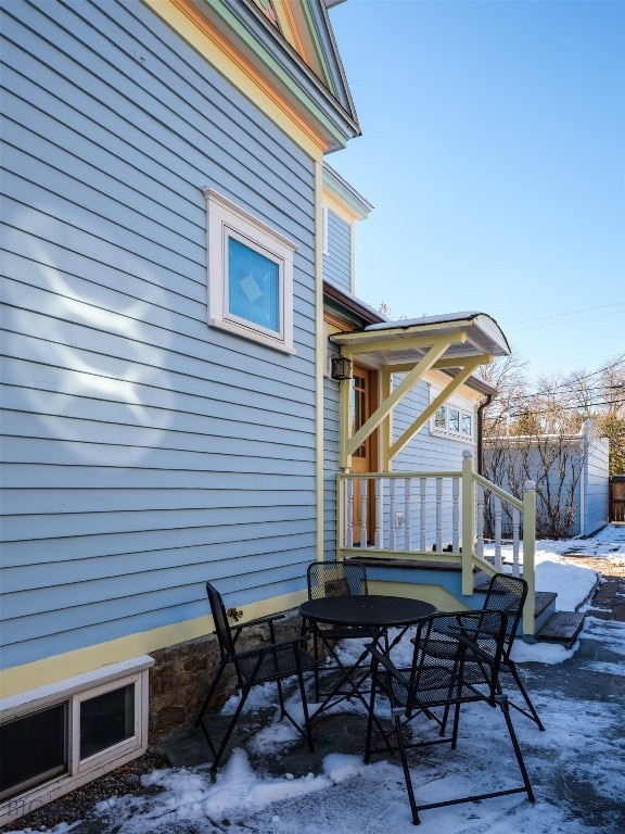 view of snow covered patio