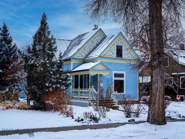 victorian-style house with covered porch