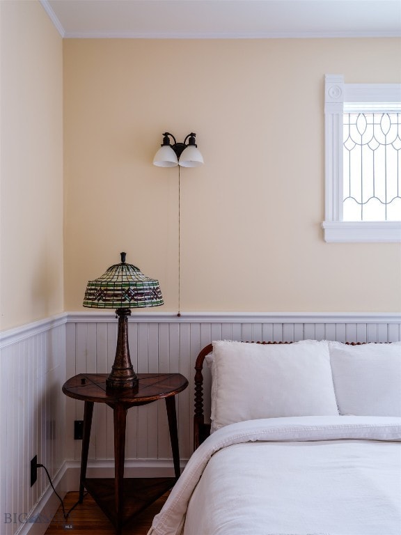 bedroom with hardwood / wood-style flooring