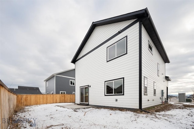 view of snow covered house