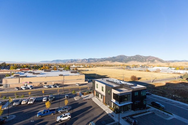 drone / aerial view featuring a mountain view