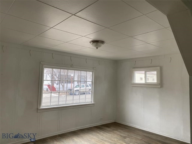 spare room with hardwood / wood-style flooring