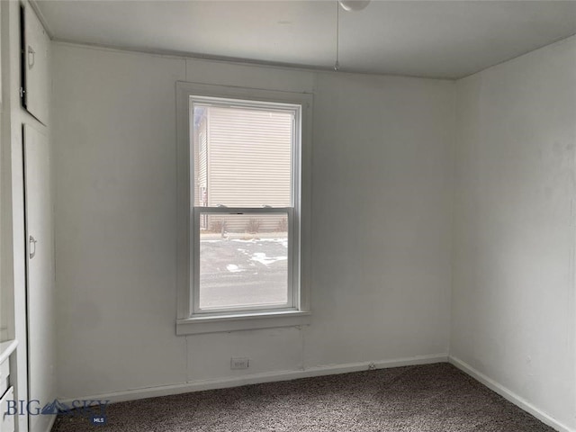 empty room featuring carpet floors