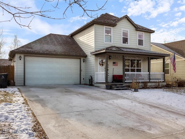 front of property with a porch and a garage