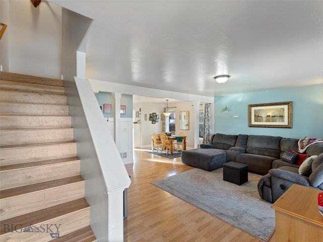 living room with light hardwood / wood-style flooring