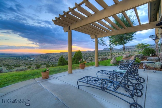 1061 Lookabout Ln, Manhattan, MT 59741 - view of patio / terrace with a mountain view and a pergola