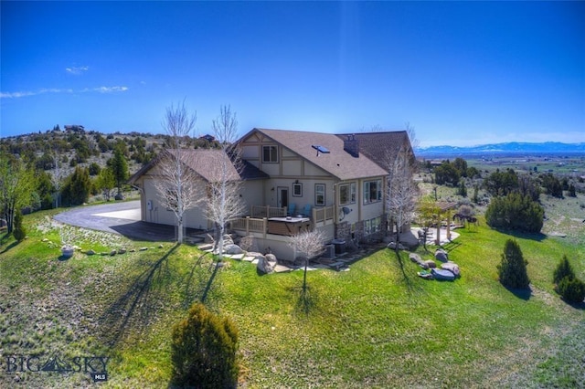 1061 Lookabout Ln, Manhattan, MT 59741 - back of house featuring a lawn and driveway