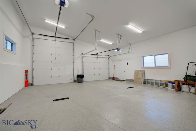 1061 Lookabout Ln, Manhattan, MT 59741 - garage featuring a garage door opener