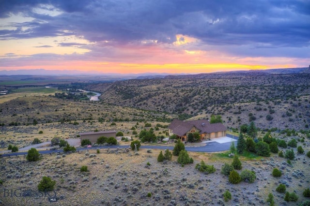 1061 Lookabout Ln, Manhattan, MT 59741 - aerial view at dusk of a mountain view and a view of rural / pastoral area