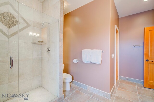 1061 Lookabout Ln, Manhattan, MT 59741 - bathroom with a shower stall, toilet, and baseboards