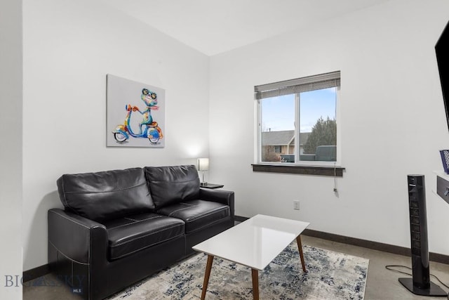 living room featuring concrete floors