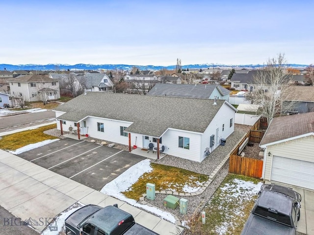 birds eye view of property with a mountain view