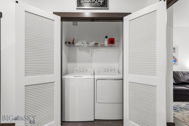 washroom featuring washing machine and dryer