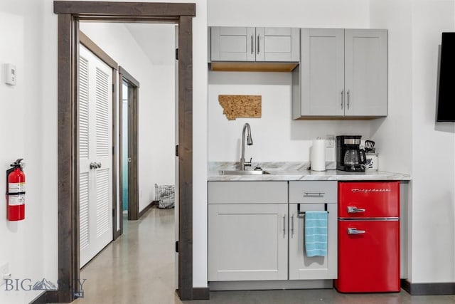 kitchen with gray cabinets and sink