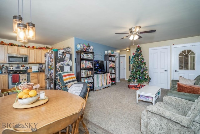 dining space with ceiling fan