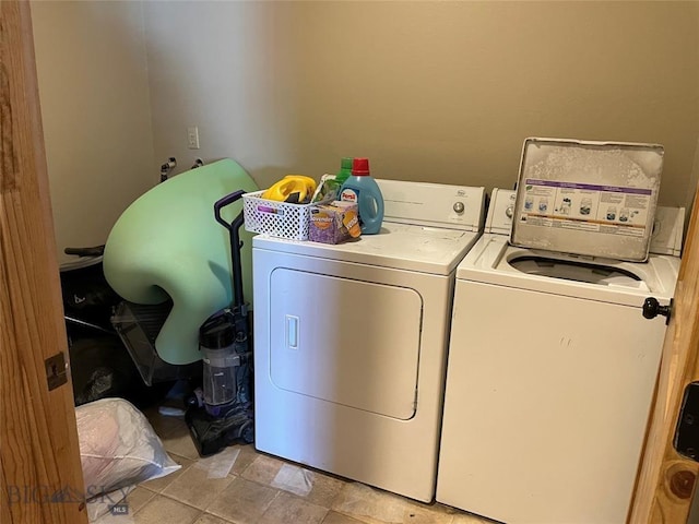 washroom with separate washer and dryer