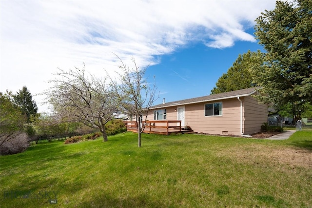 view of yard with a deck