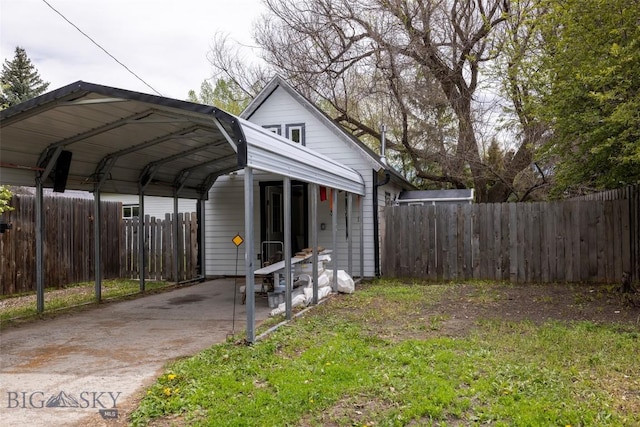 view of outbuilding featuring a carport