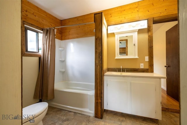 full bathroom with vanity, wooden walls, shower / bathtub combination with curtain, and toilet